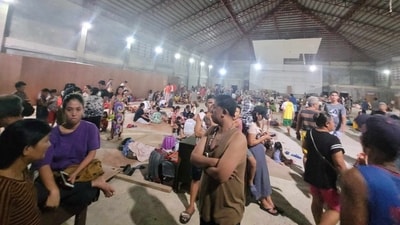 People gather at an evacuation center, in the aftermath of an earthquake, in Hinatuan, Surigao del Sur, Philippines December 2, 2023. (via REUTERS)