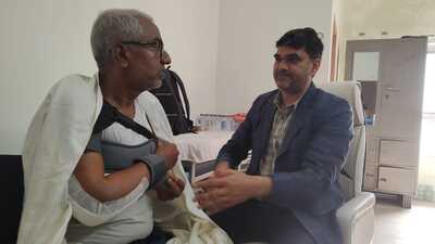 Prof Shailendra Singh with patient. (Sourced) Prof Shailendra Singh with patient. (Sourced)