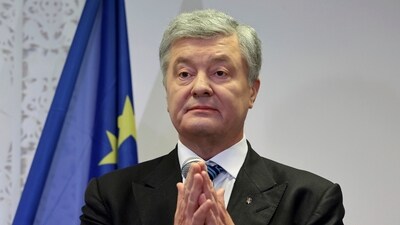FILE - Former Ukrainian President Petro Poroshenko speaks to reporters in Warsaw, Poland, on Sunday Jan. 16, 2021. (AP)