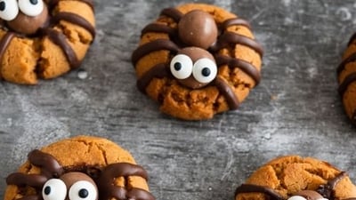 Spider Halloween Cookies: Make Spider Halloween Cookies by decorating round cookies with black icing to create spider bodies and adding black liquorice or pretzel sticks as legs for a spooky Halloween treat. (Pinterest) Spider Halloween Cookies: Make Spider Halloween Cookies by decorating round cookies with black icing to create spider bodies and adding black liquorice or pretzel sticks as legs for a spooky Halloween treat. (Pinterest)