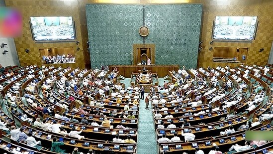 Members of Parliament voting on clauses of the Women's Reservation Bill in the Lok Sabha in New Delhi on September 20, 2023. (ANI/Sansad TV)