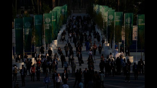 People at the COP28 UN Climate Summit in Dubai on Saturday. (AP)