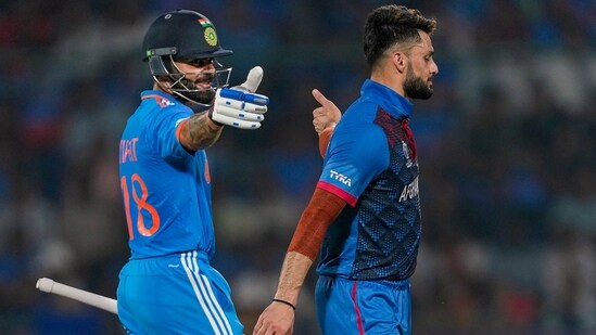 Kohli and Naveen gesture towards each other during the ODI World Cup (AFP)