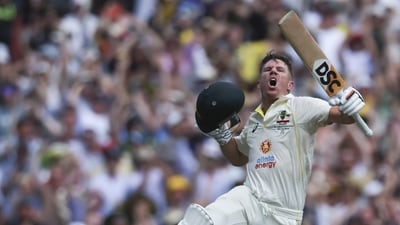Australia's David Warner celebrates after scoring 200 runs during the second Test between South Africa and Australia (AP) Australia's David Warner celebrates after scoring 200 runs during the second Test between South Africa and Australia (AP)