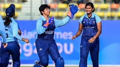 Titas Sadhu (R) celebrates with teammates after the dismissal of Sri Lanka's Anushka Sanjeewani (AFP) Titas Sadhu (R) celebrates with teammates after the dismissal of Sri Lanka's Anushka Sanjeewani (AFP)