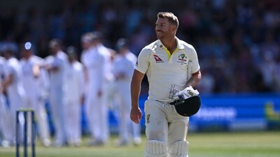 David Warner reacts as he walks back to the pavilion after losing his wicket for 1 during Ashes 2023 (AFP)