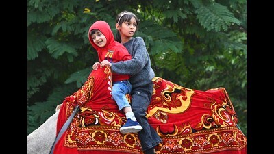Children enjoying a camel ride near Sukhna Lake in Chandigarh on a sunny day. (Keshav Singh/HT) Children enjoying a camel ride near Sukhna Lake in Chandigarh on a sunny day. (Keshav Singh/HT)