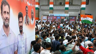 Congress supporters celebrate victory in Telangana. (AFP) Congress supporters celebrate victory in Telangana. (AFP)