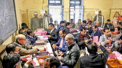 Counting of votes for the Rajasthan Assembly elections underway at a center, in Jaipur. (PTI) Counting of votes for the Rajasthan Assembly elections underway at a center, in Jaipur. (PTI)