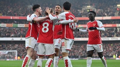 Arsenal's Norwegian midfielder #08 Martin Odegaard (2L) celebrates scoring the team's second goal during the English Premier League football match between Arsenal and Wolverhampton Wanderers (AFP) Arsenal's Norwegian midfielder #08 Martin Odegaard (2L) celebrates scoring the team's second goal during the English Premier League football match between Arsenal and Wolverhampton Wanderers (AFP)