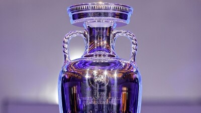 The trophy is pictured after the final draw for the UEFA Euro 2024 European Championship football competition in Hamburg (AFP) The trophy is pictured after the final draw for the UEFA Euro 2024 European Championship football competition in Hamburg (AFP)