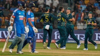 Australian players celebrates the dismissal of India's Yashasvi Jaiswal, left, during the fifth T20 cricket match between India and Australia in Bengaluru (AP) Australian players celebrates the dismissal of India's Yashasvi Jaiswal, left, during the fifth T20 cricket match between India and Australia in Bengaluru (AP)