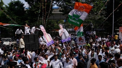 Supporters of India's main opposition party, Indian National Congress, celebrate early leads for their party in Telangana state elections in Hyderabad (AP) Supporters of India's main opposition party, Indian National Congress, celebrate early leads for their party in Telangana state elections in Hyderabad (AP)