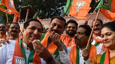 BJP party workers celebrate party's victory in Rajasthan, Madhya Pradesh and Chhattisgarh at Shivaji Maharaj Chowk Vashi in Navi Mumbai, India, on Sunday, December 3, 2023. (Photo by Bachchan Kumar/ HT PHOTO) (HT PHOTO) BJP party workers celebrate party's victory in Rajasthan, Madhya Pradesh and Chhattisgarh at Shivaji Maharaj Chowk Vashi in Navi Mumbai, India, on Sunday, December 3, 2023. (Photo by Bachchan Kumar/ HT PHOTO) (HT PHOTO)
