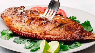 Feast your senses to a gourmet delight of Oven Roasted Whole Tilapia Fish with this recipe (Photo by Chef Aji Joseph) Feast your senses to a gourmet delight of Oven Roasted Whole Tilapia Fish with this recipe (Photo by Chef Aji Joseph)