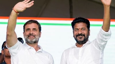 Congress leader Rahul Gandhi with Telangana Pradesh Congress Committee President Revanth Reddy waves to supporters during a public meeting ahead of Telangana Assembly elections, (PTI) Congress leader Rahul Gandhi with Telangana Pradesh Congress Committee President Revanth Reddy waves to supporters during a public meeting ahead of Telangana Assembly elections, (PTI)