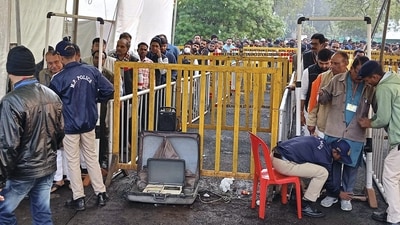 Madhya Pradesh election results:: Representatives of different political parties undergo a security check as they arrive to witness counting of votes in Bhopal. (PTI) Madhya Pradesh election results:: Representatives of different political parties undergo a security check as they arrive to witness counting of votes in Bhopal. (PTI)