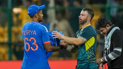 Suryakumar Yadav greets Matthew Wade after India won the 5th T20I against Australia at M. Chinnaswamy Stadium, in Bengaluru (PTI)