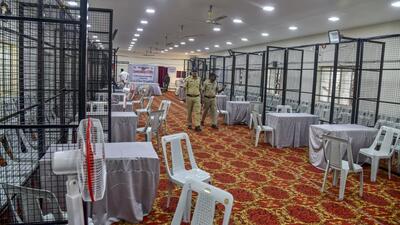Policemen review arrangements for counting of votes for the Telanagna Assembly election in Hyderabad. (PTI) Policemen review arrangements for counting of votes for the Telanagna Assembly election in Hyderabad. (PTI)