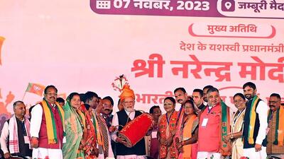 Prime Minister Narendra Modi with Chhattisgarh BJP chief Arun Sao at a public meeting. (PTI) Prime Minister Narendra Modi with Chhattisgarh BJP chief Arun Sao at a public meeting. (PTI)