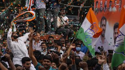 Supporters of Congress celebrate victory for their party in Telangana state elections in Hyderabad on Sunday. (AP) Supporters of Congress celebrate victory for their party in Telangana state elections in Hyderabad on Sunday. (AP)