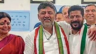 Telangana Congress chief Revanth Reddy along with Karnataka Deputy Chief Minister DK Shivakumar and party leaders celebrate as the party leads in State Assembly elections, in Hyderabad on Sunday. (ANI) Telangana Congress chief Revanth Reddy along with Karnataka Deputy Chief Minister DK Shivakumar and party leaders celebrate as the party leads in State Assembly elections, in Hyderabad on Sunday. (ANI)