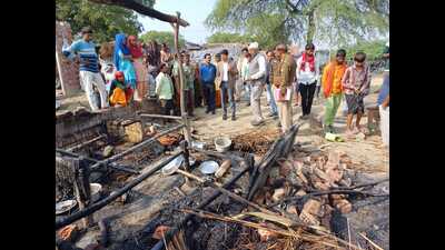 The thatched house caught fire, in a village in Firozabad district on Saturday night (HT)