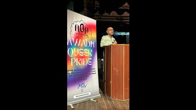 Yadavendra Singh, founding member of Lucknow-based queer collective Awadh Queer Pride, welcomes the audience to a celebration of Transgender Day of Remembrance at Sangeet Natak Akademi on Sunday. (HT Photo)