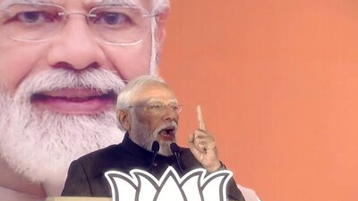 Prime Minister Narendra Modi addresses party workers at BJP headquarters in Delhi.