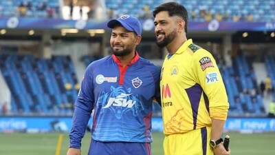 MS Dhoni and Rishabh Pant pose for a photograph. MS Dhoni and Rishabh Pant pose for a photograph.