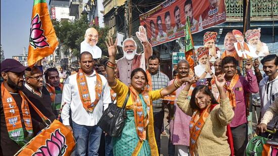 BJP supporters celebrating the party's lead in Madhya Pradesh, Rajasthan and Chhattisgarh. (PTI)