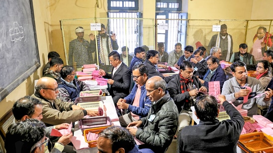 Counting of votes for the Rajasthan Assembly elections underway at a center, in Jaipur. (PTI)