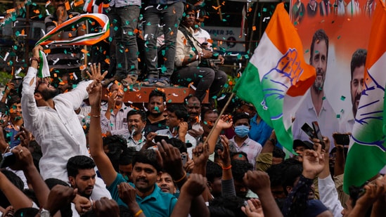 Congress workers celebrating the INC victory in the Telangana state elections in Hyderabad Congress workers celebrating the INC victory in the Telangana state elections in Hyderabad