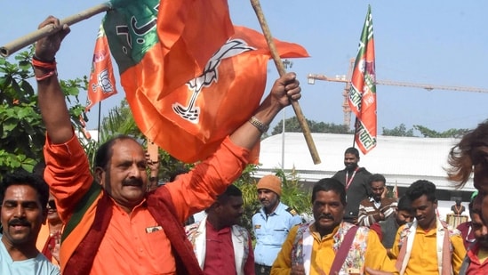 BJP workers celebrate the party's lead during counting of votes for MP Assembly elections. BJP workers celebrate the party's lead during counting of votes for MP Assembly elections.