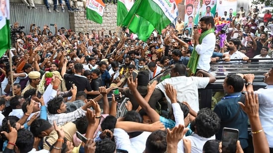 Hyderabad: Congress Telangana President A Revanth Reddy greets party workers and supporters celebrating the party's lead during counting of votes for Telangana Assembly elections, in Hyderabad, Sunday, Dec. 3, 2023. (Source: PTI) (PTI)