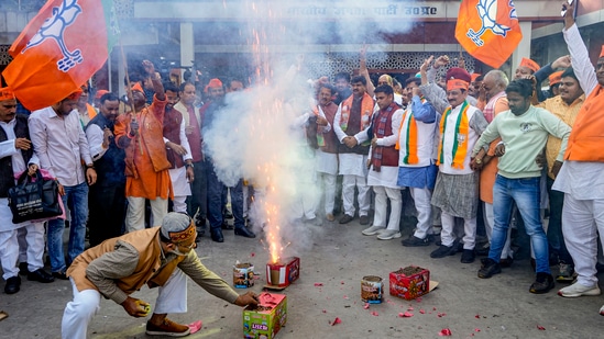 BJP workers and supporters celebrate the party's lead in Madhya Pradesh, Rajasthan and Chhattisgarh during counting of votes for the Assembly elections. BJP workers and supporters celebrate the party's lead in Madhya Pradesh, Rajasthan and Chhattisgarh during counting of votes for the Assembly elections.