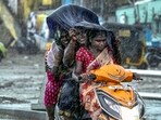 Cyclone Michaung in Tamil Nadu: Commuters during heavy rain owing to Cyclone Michaung, in Chennai. Cyclone Michaung in Tamil Nadu: Commuters during heavy rain owing to Cyclone Michaung, in Chennai.