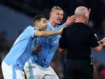 Manchester City's Erling Braut Haaland and Mateo Kovacic remonstrate with referee Simon Hooper 