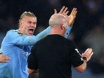 Manchester City's Erling Braut Haaland remonstrates with referee Simon Hooper.