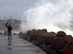 Tidal waves hit the coast under the influence of the 'Severe' Cyclone Michaung, at the Kasimedu fishing harbour, in Chennai on Sunday. Tidal waves hit the coast under the influence of the 'Severe' Cyclone Michaung, at the Kasimedu fishing harbour, in Chennai on Sunday.
