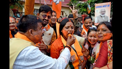 BJP workers celebrate as the party leads in Madhya Pradesh, Rajasthan, and Chhattisgarh assembly elections during the counting of votes, in Ranchi on Sunday. (ANI) BJP workers celebrate as the party leads in Madhya Pradesh, Rajasthan, and Chhattisgarh assembly elections during the counting of votes, in Ranchi on Sunday. (ANI)