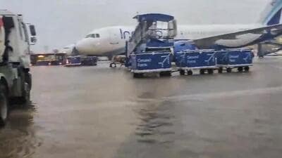 Chennai Airport runway inundated amid incessant rains triggered by Cyclone Michaung, in Chennai, Monday (PTI) Chennai Airport runway inundated amid incessant rains triggered by Cyclone Michaung, in Chennai, Monday (PTI)