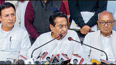 Congress leaders Kamal Nath, Randeep Singh Surjewala and Digvijaya Singh in Bhopal on Sunday. (PTI) Congress leaders Kamal Nath, Randeep Singh Surjewala and Digvijaya Singh in Bhopal on Sunday. (PTI)