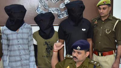 DCP (rural) Vivek Chandra Yadav (seated) addresses the media about the arrest of three gang-rape suspects (in hoods) in Ghaziabad, on Monday. (Sakib Ali HT Photo) DCP (rural) Vivek Chandra Yadav (seated) addresses the media about the arrest of three gang-rape suspects (in hoods) in Ghaziabad, on Monday. (Sakib Ali HT Photo)