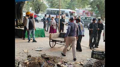 Encroachments being removed from Phase 11 in Mohali on Monday.With Mohali likely to get its first-ever street vending sites latest by December 15 which will accommodate scores of vendors at the two sites for now, residents, especially pedestrians, will enjoy the encroachment-free passage in busy markets. (HT Photo) Encroachments being removed from Phase 11 in Mohali on Monday.With Mohali likely to get its first-ever street vending sites latest by December 15 which will accommodate scores of vendors at the two sites for now, residents, especially pedestrians, will enjoy the encroachment-free passage in busy markets. (HT Photo)