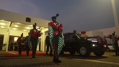 Members of the Nigerian Army brigade see-off German Chancellor. (AFP) Members of the Nigerian Army brigade see-off German Chancellor. (AFP)