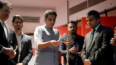 Noida MLA Pankaj Singh (centre) opens the ‘smart pathshala’ programme in Sector 6, Noida, on Monday. (Sunil Ghish/HT Photo)
