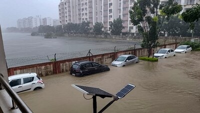 Vehicles stuck at a locality flooded due to heavy rain owing to Cyclone Michaung, in Chennai, Monday, Dec. 4, 2023. (PTI) Vehicles stuck at a locality flooded due to heavy rain owing to Cyclone Michaung, in Chennai, Monday, Dec. 4, 2023. (PTI)