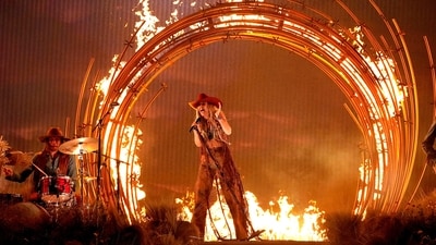 Lainey Wilson performs "Wildflowers and Wild Horses" at the 57th Annual CMA Awards on Wednesday, Nov. 8, 2023, at the Bridgestone Arena in Nashville, Tenn. (AP Photo/George Walker IV) (George Walker IV/Invision/AP)