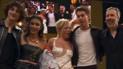 A video shared on social media shows an unknown object suddenly striking Florence while she posed for photos on stage with co-stars including Zendaya, Timothée Chalamet and Austin Butler (X) A video shared on social media shows an unknown object suddenly striking Florence while she posed for photos on stage with co-stars including Zendaya, Timothée Chalamet and Austin Butler (X)